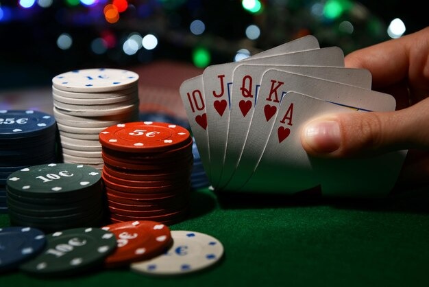 Casino Hold'em table selection on mobile showing available tables and bet limits